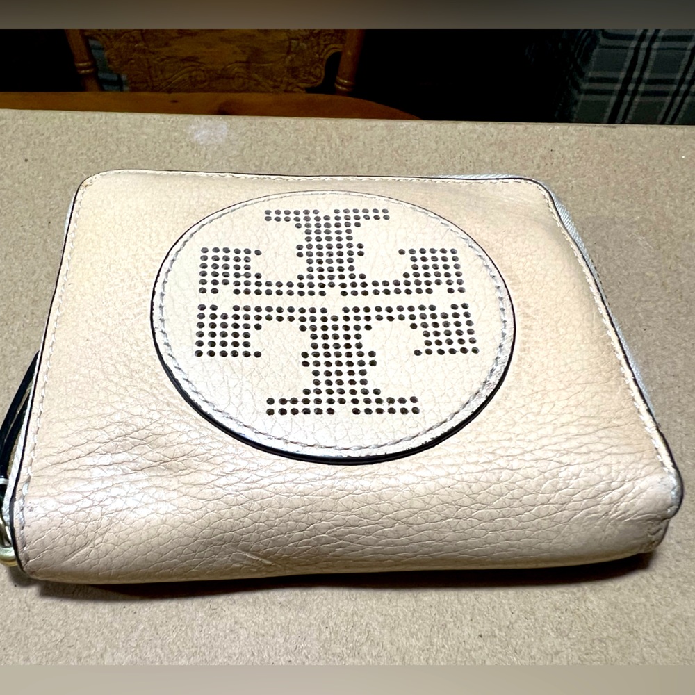 Tory Burch logo bifold wallet in cream. Slightly used. Inside like new